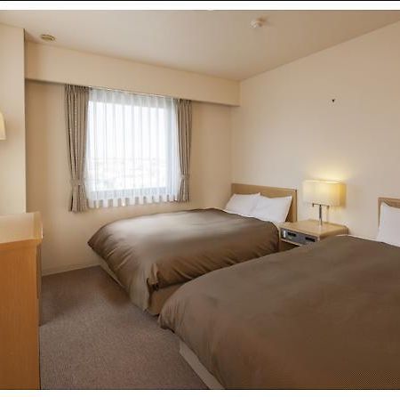 Hotel Glad One Minamiosaka Osaka Quarto foto